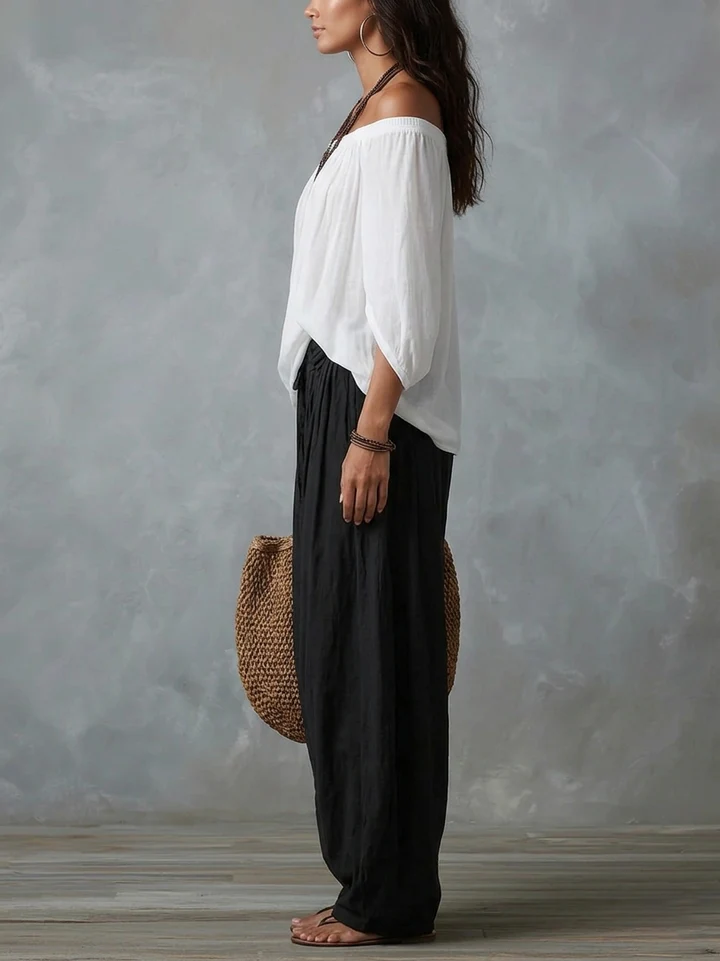 Conjunto Amara? | Blusa Bardot Negra y Pantal¨®n Lanterne Rojo